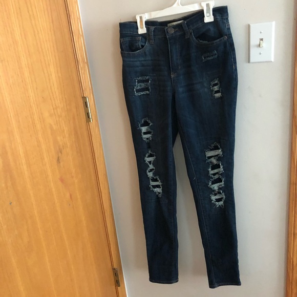 ripped patched skinny jeans